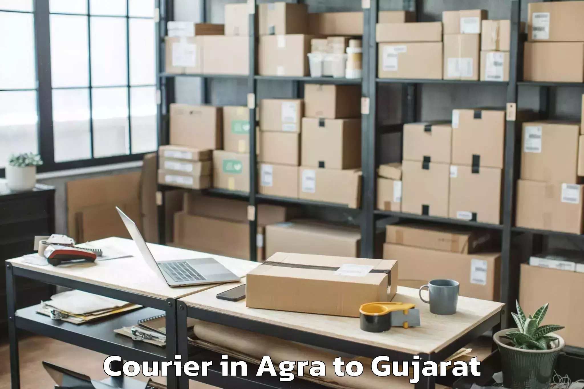 Reliable Agra to Junagadh Courier